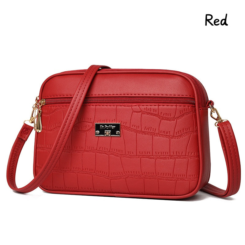 đDivatos, egyszerƱ nĆi crossbody tĂĄska